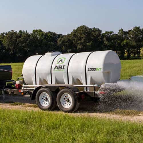 Truck Hauling 1000 Gallon Water Trailer Dust Abatement