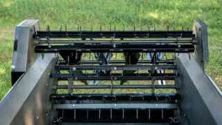 Tractor 85 ground drive manure spreader shredding beater bars