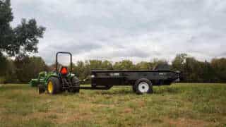 125 PTO pull behind Manure Spreader in a pasture