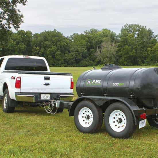 Truck Hauling Potable Water Trailer