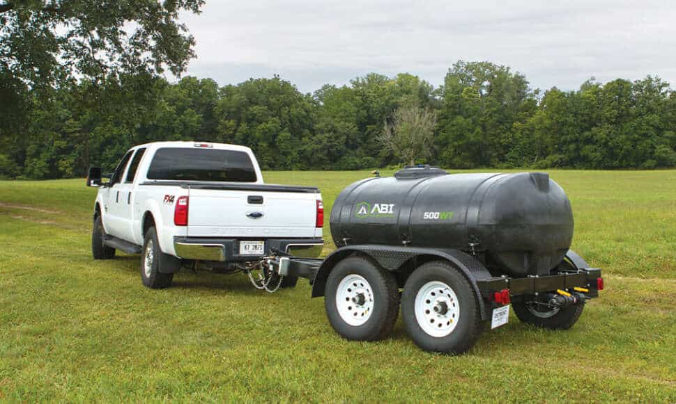 Truck Hauling Potable Water Trailer