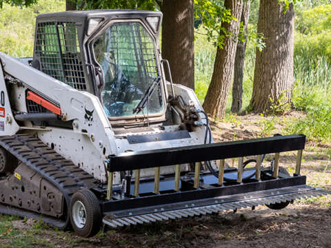 ABI SR2 Rake on Skid Steer