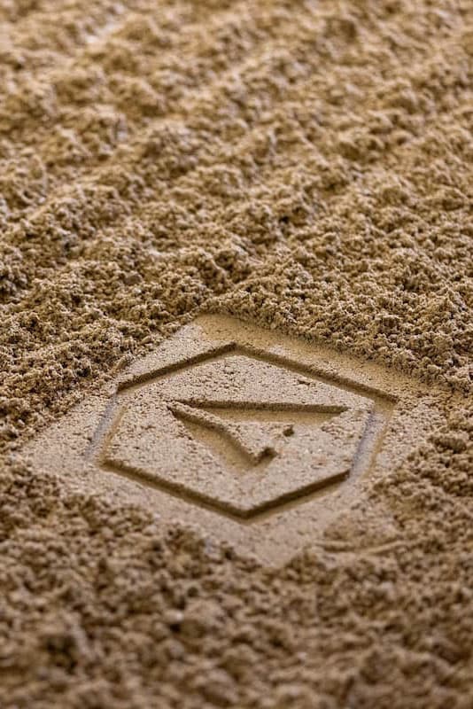 ABI logo pressed into freshly dragged ground